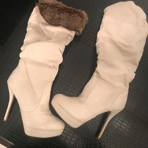 Cream suede boots, with brown fur foldover.